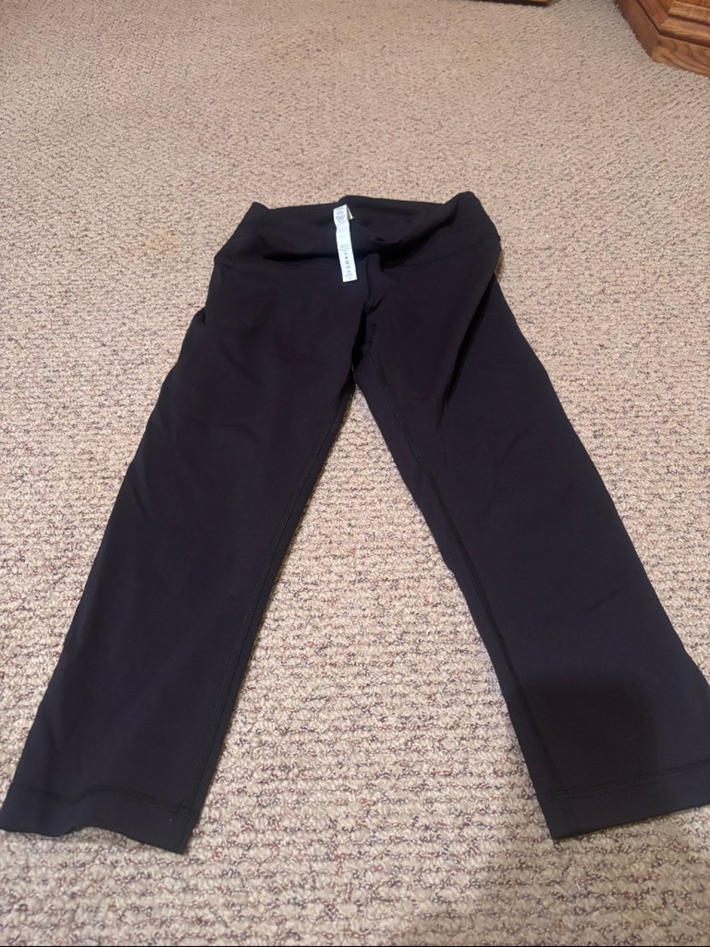 Lululemon wunder under capri length black leggings.